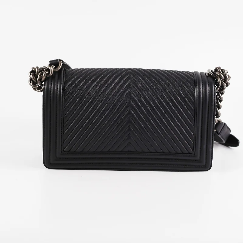 Chanel bags with intricate metal hardwareChanel Old Medium Boy Chevron Black