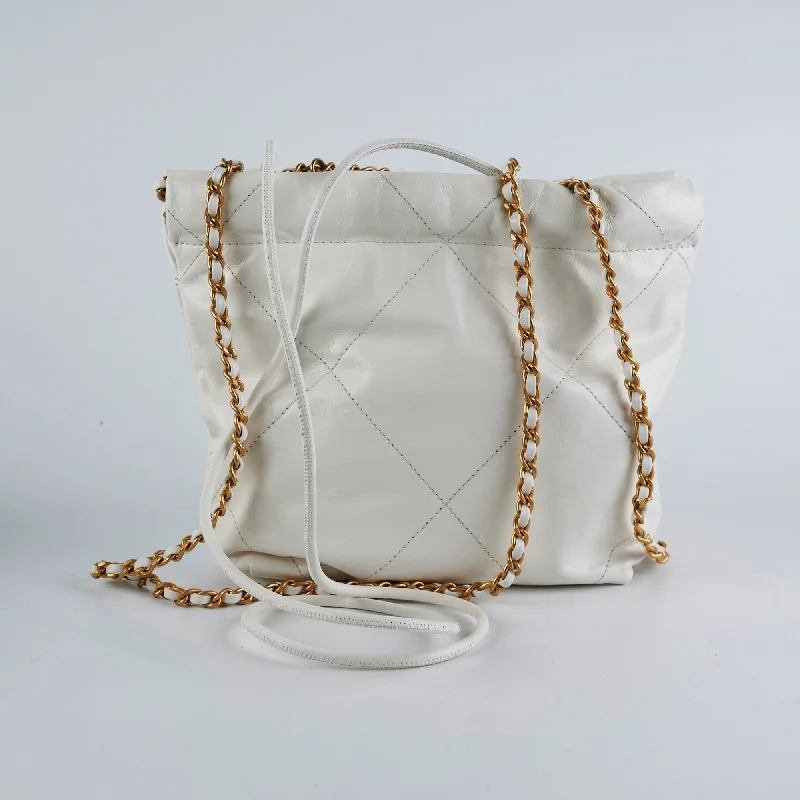 Chanel bags as wedding day accessoriesITEM 10 - Chanel 22 Mini White Calfskin Bag - Microchipped