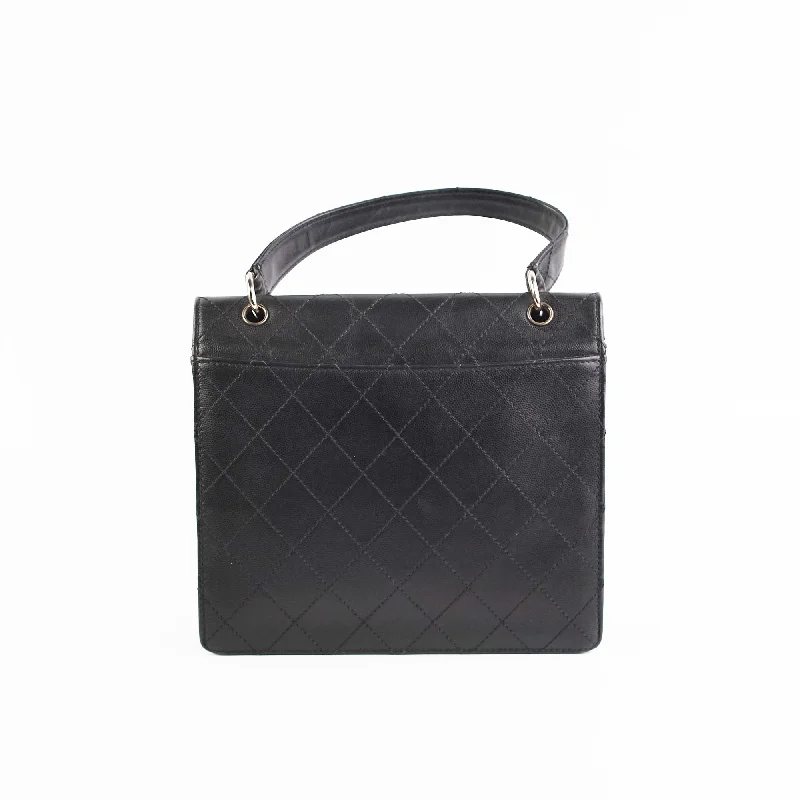 Chanel bags with adjustable chain strapsITEM 31 - Chanel Vintage Square Black Top Handle Bag