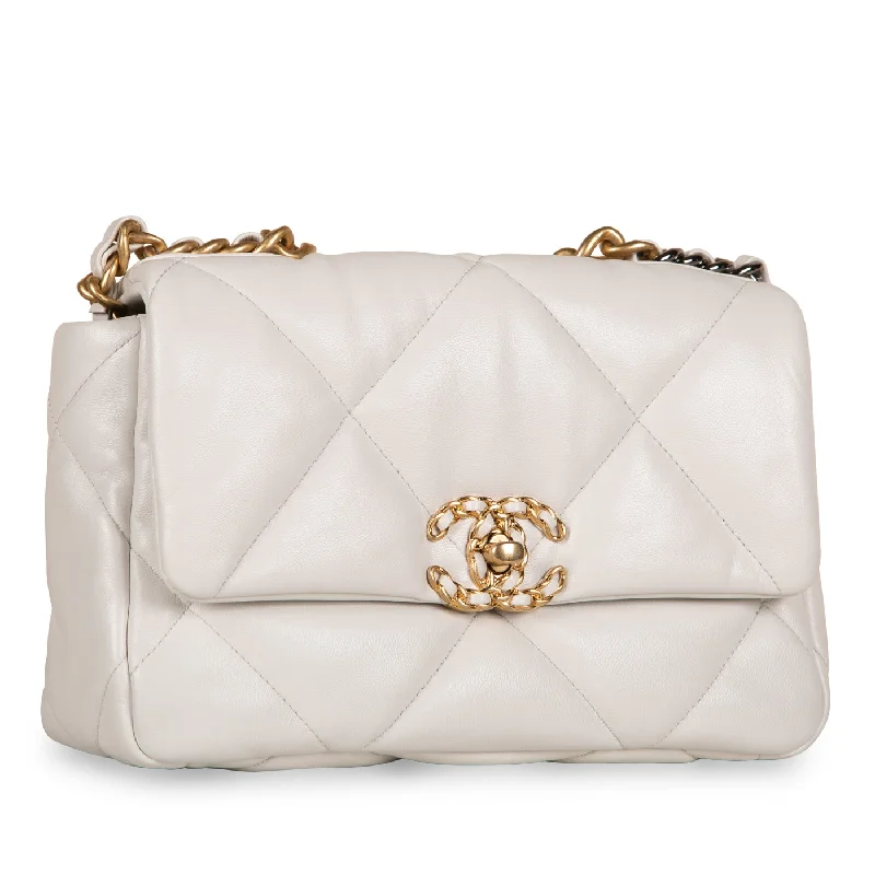 Chanel bags with gold, silver, and pearl accentsChanel 19 Flap Bag - Small