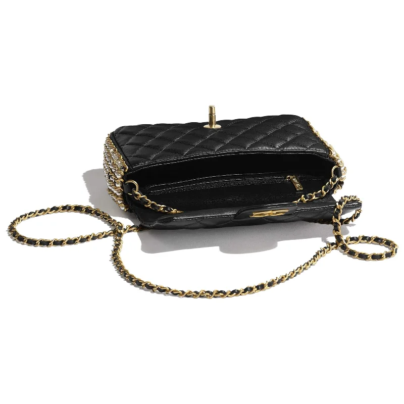 Chanel bags available at online luxury retaileChanel Classic Jumbo Double Flap Bag Black Gold Hardware