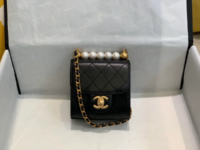 Chanel bags with leather and tweed combinationsChanel Clutch With Chain And Pearls Black