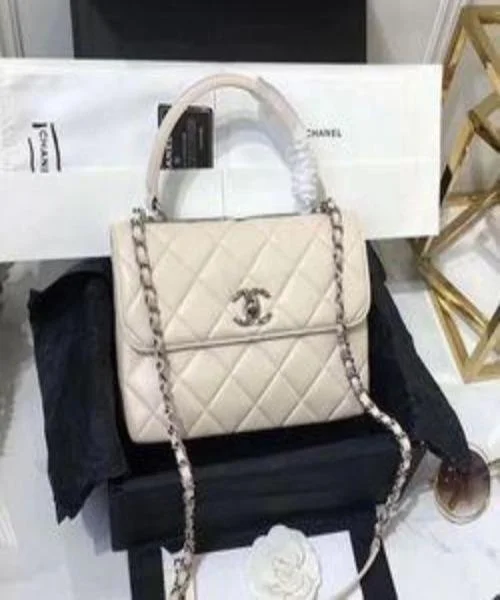 Chanel bags with intricate metal hardwareChanel Flap Bag With Top Handle White