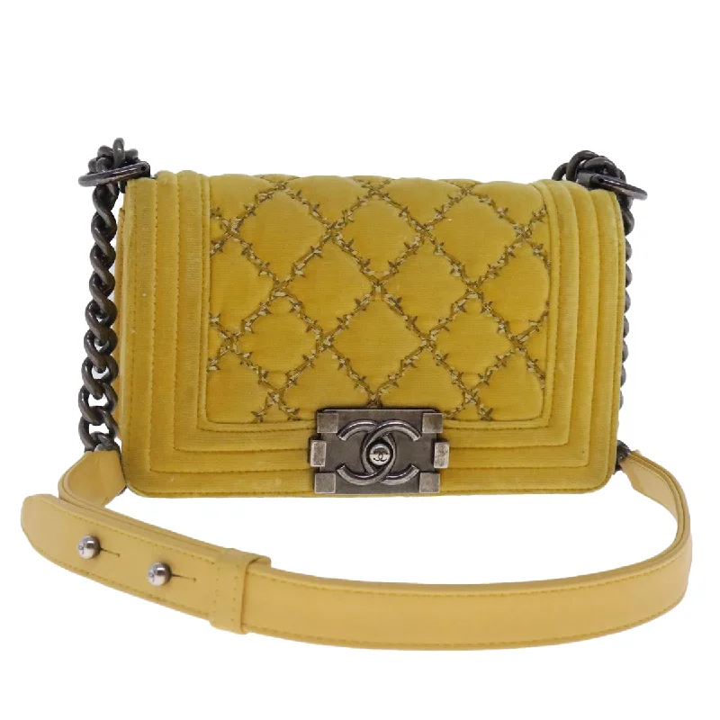 Chanel bags that pair perfectly with any outfitCHANEL Matelasse 20 Chain Boy Chanel Shoulder Bag Velor Yellow CC  94468A