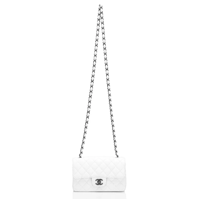 Chanel bags with iconic stitching detailsChanel Mini Classic Rectangle Flap Bag White