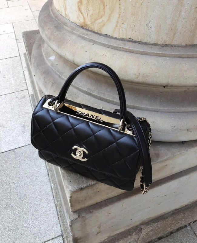 Chanel bags available in bold colors and patternsChanel Small Flap Bag With Top Handle Black